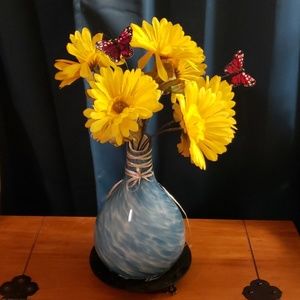 Floral arrangement with vase
